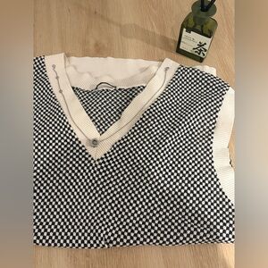 black and white checkered sweater vest